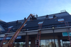 Installation of shingle roof in Barrington RI shopping plaza with new custom skylights